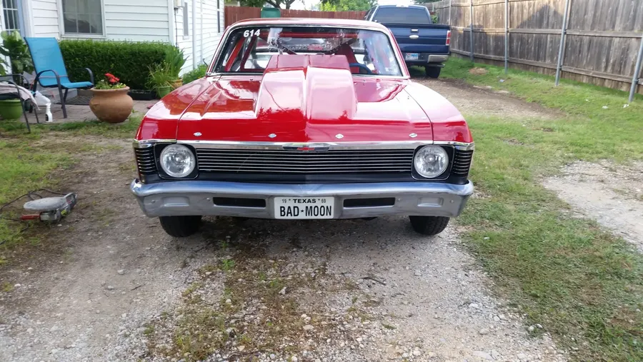 Red classic car finished front view